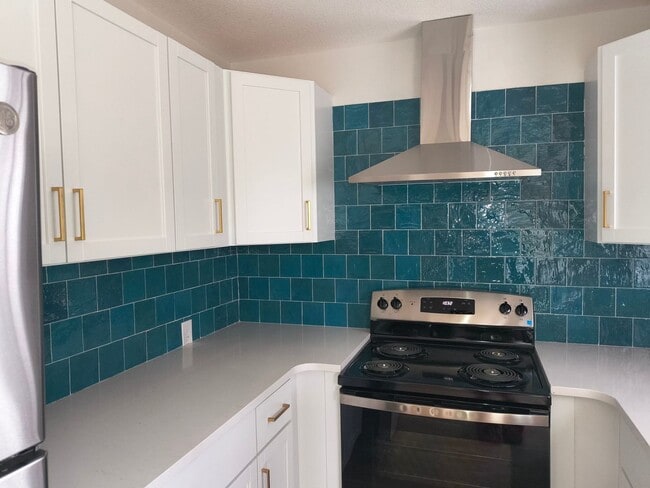 Building Photo - Welcome to Your Next Home with Harvest Investments!