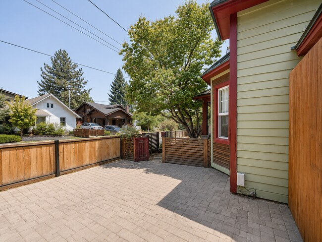 Building Photo - Heart of Bend Oasis: 3-Bedroom Home with Live-Edge Accents, New Carpet, and Fenced-In Parking