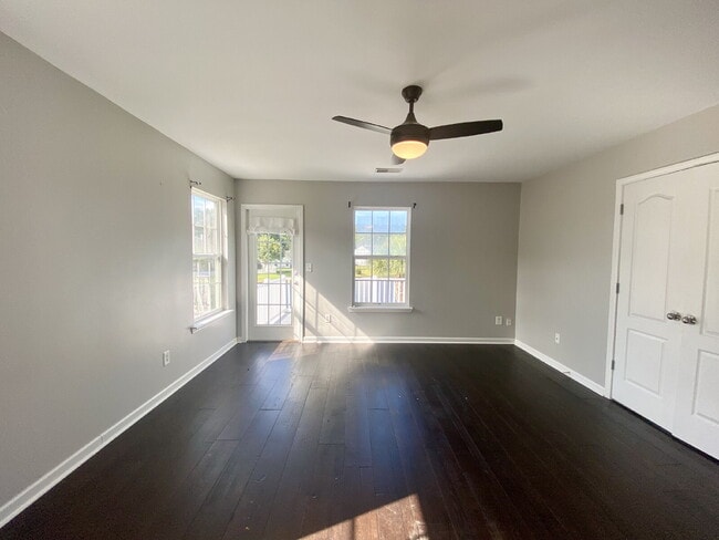 Building Photo - Three Bedroom Home with fenced-in Backyard oasis!