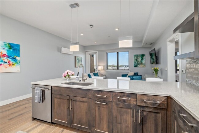 Building Photo - COME HOME TO REFINED DOWNTOWN LUXURY CONDO...