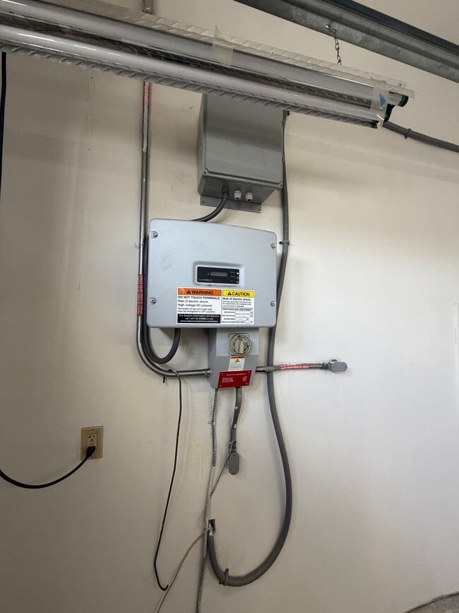 Building Photo - Spacious Modern Home with EV Charger, Solar & Gated 3-Car Garage