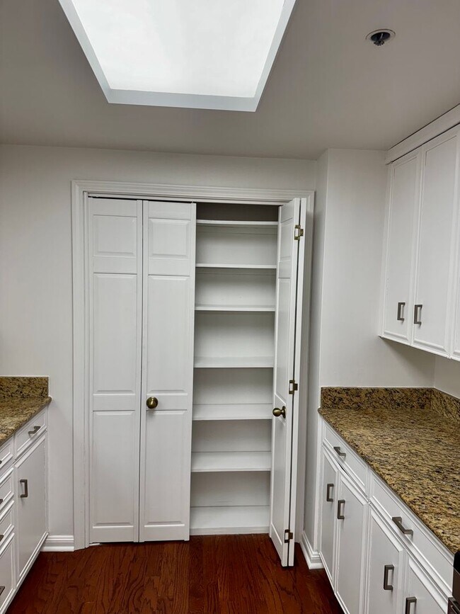 Building Photo - Experience Luxury and Prestige at Yorktown Condominiums