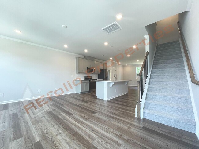 Building Photo - Brand-New 3BR/3.5BA Townhome w/ 1 Car Gara...
