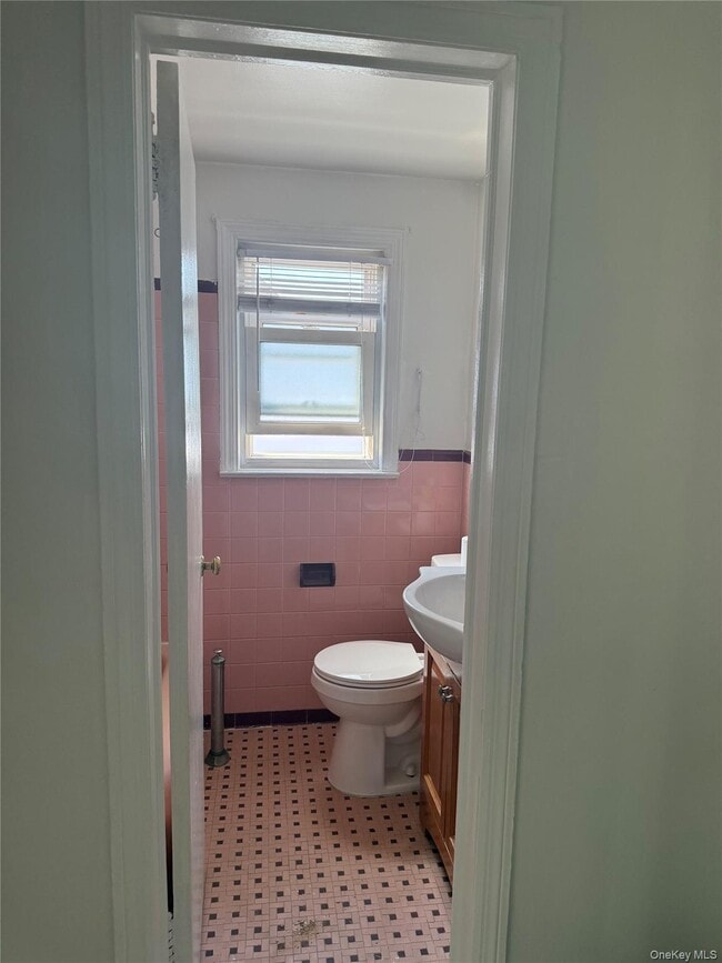 Building Photo - 203-06 53rd Ave