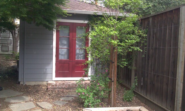 Cottage windows facing garden gate - 134 S 12th St