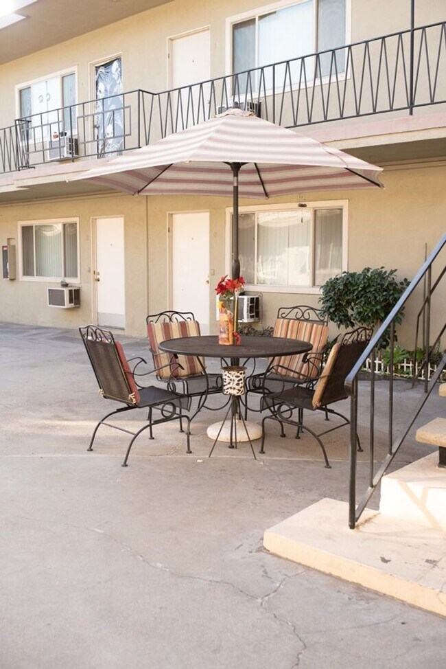 Building Photo - 1/2 OFF FIRST MONTH'S RENT studio with ALL UTILITIES PAID!