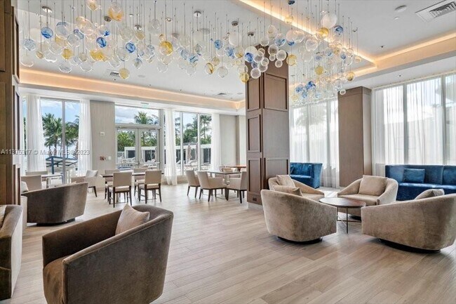 Building Photo - 10155 Collins Ave