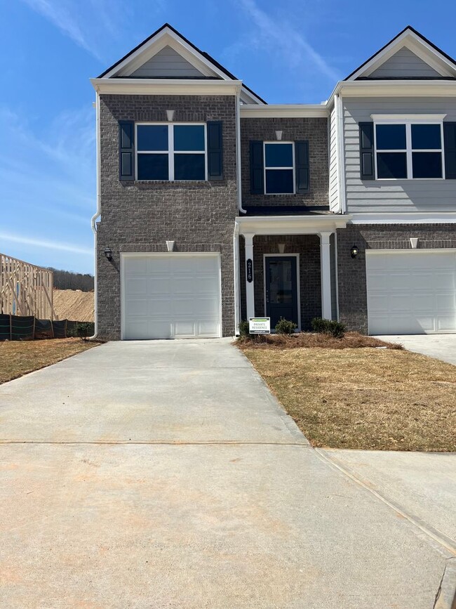 Building Photo - Beautiful Newly Constructed 3/.25 Townhome!