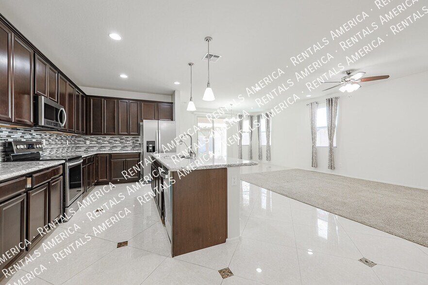 Building Photo - 10915 E Calypso Ave