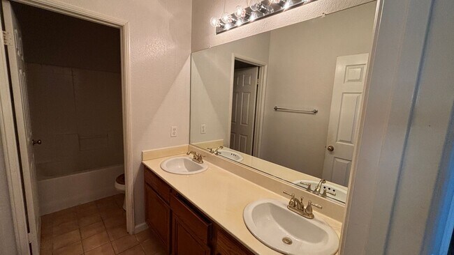 Building Photo - Adorable Four Bedroom home ready for its forever family!