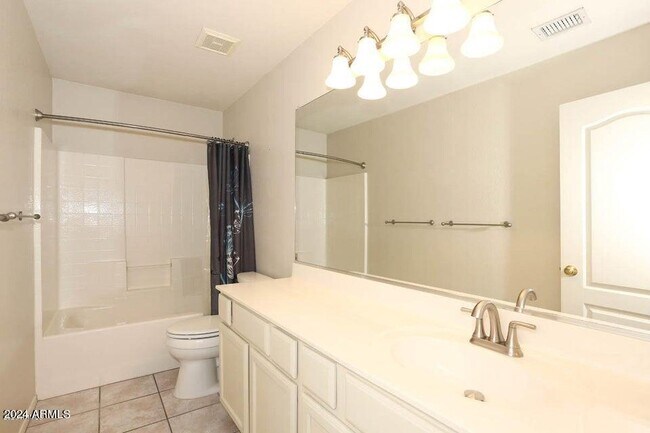 Building Photo - 7931 W Rose Garden Ln