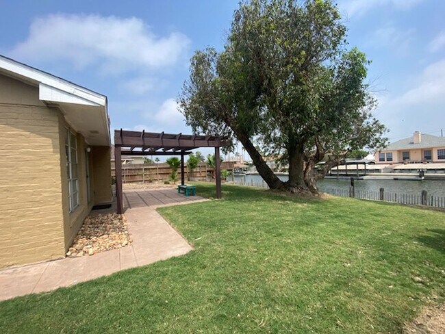 Building Photo - WATERFRONT HOME W/ FENCED YARD