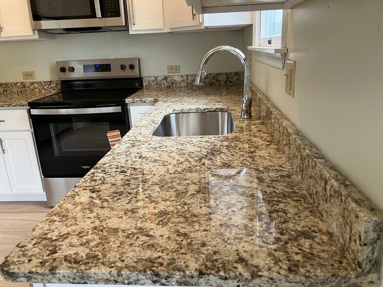 Luxurious granite countertops - 104 E Poplar St