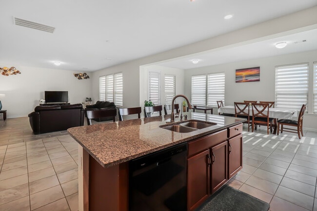 Spacious Kitchen open to the living room - 25315 Western Sage Ln