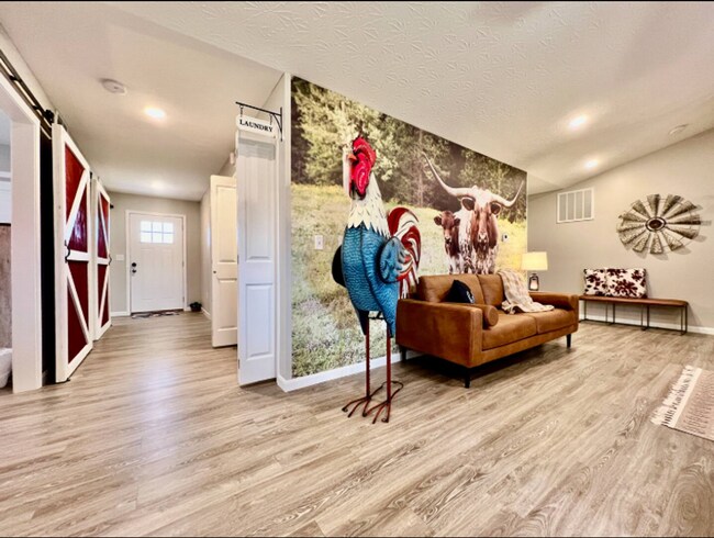 Building Photo - NEW Farmhouse Retreat Rustic decor and Cozy vibes!