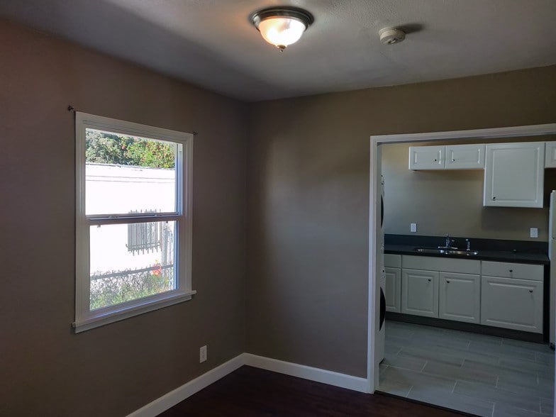 dining area leading to kitchen - 6414 10th Ave