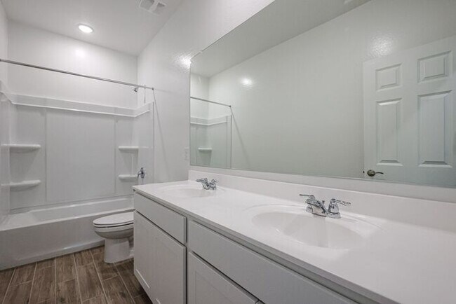 Building Photo - HOME IN LAVEEN! 4 BED 3.5 BA 3 CAR GARAGE!...
