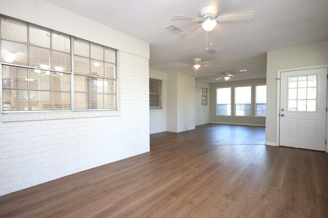 Building Photo - Fully Renovated 3BR/2BA Molino Home on a Spacious Lot Featuring Multiple Living Areas, Sunroom & ...