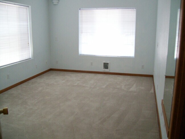 Building Photo - Centrally Located Custom Home each bedroom...