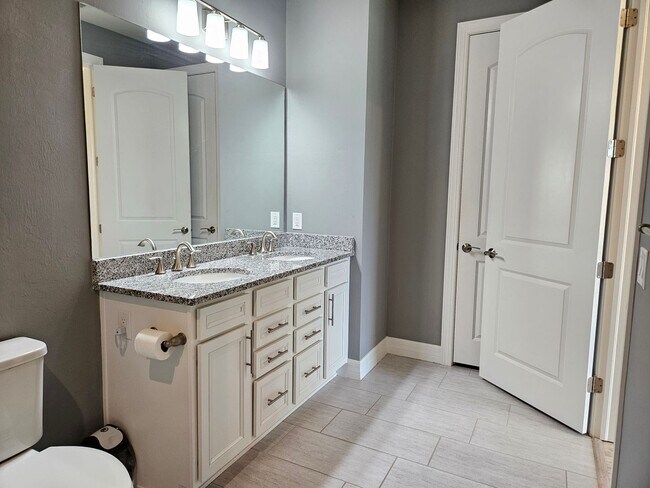 Building Photo - Stunning Model Home – 2 Bedrooms plus Den,...