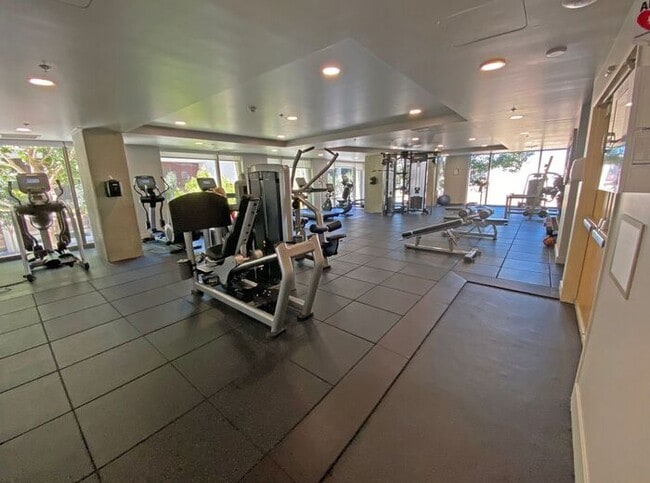 Building Photo - Live at The Axis High-Rise! Upscale, Urban...