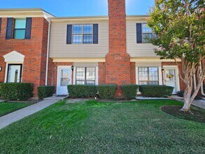 Building Photo - Stunning two-level, two-bedroom, one-and-a-half-bathroom townhome