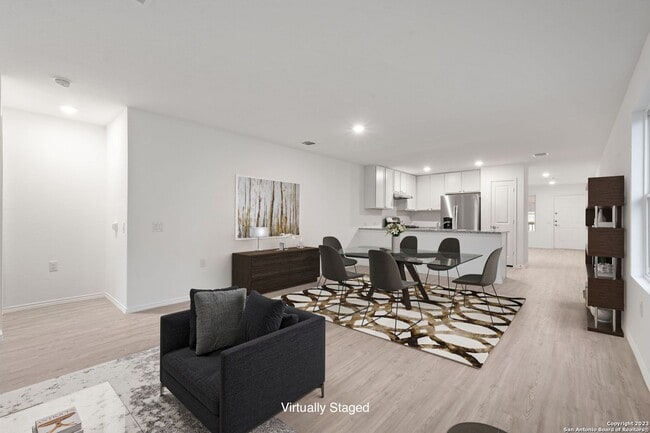 Building Photo - This beautiful single-story home has 4 bedrooms, 2 baths, vinyl flooring throughout, an open floo...