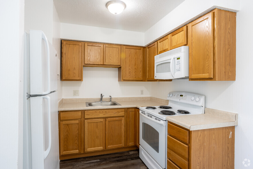 2BR, 1BA - 715SF Kitchen - Village on Grand