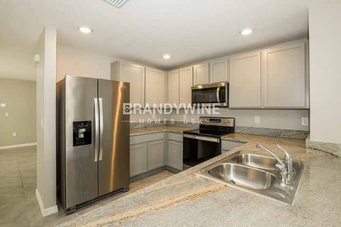 Building Photo - 5488 Logan Cave Ave