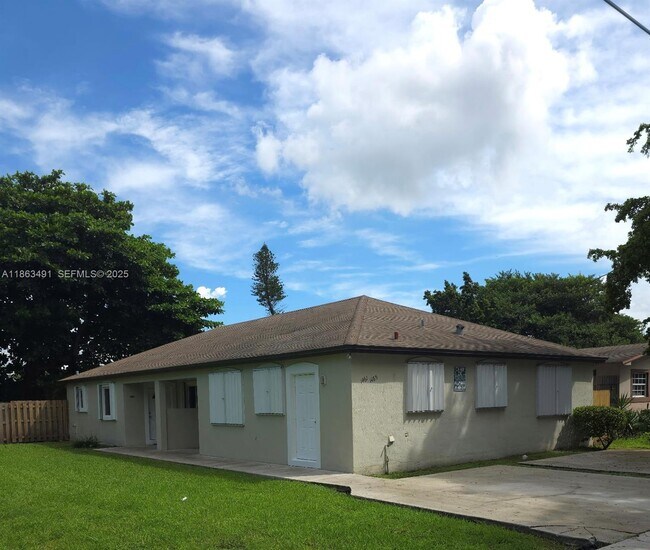 Building Photo - 1465 NW 59th St