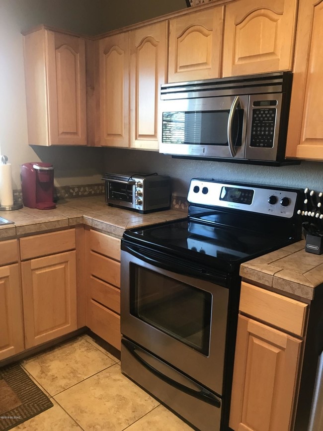 Building Photo - 7050 E Sunrise Dr