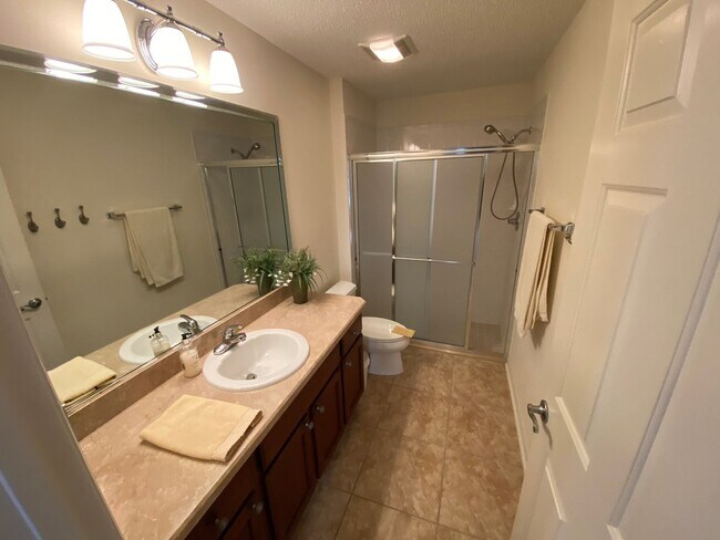 Building Photo - SEASONAL RENTAL. Large 4 Bed + 4 1/2 Baths Home, w/Views of the Jacaranda Golf Course and Lake in...