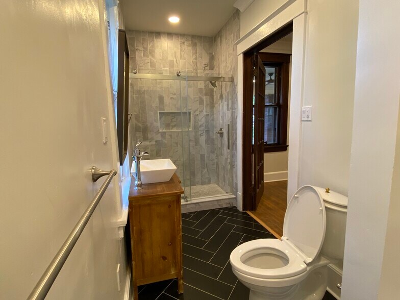 Guest bathroom with access to bedroom #2 - 327 N Willett St