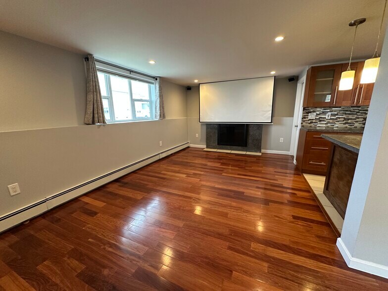 A/V Projector Entertainment System pre-installed in Living Room - 4 Grand Ave
