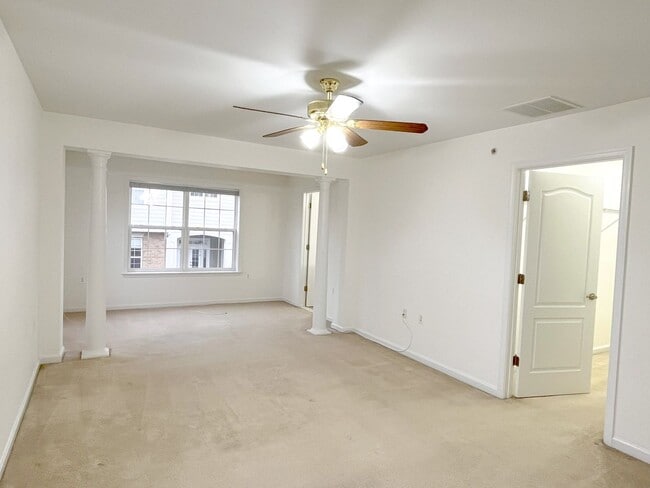 Building Photo - Sizable End Unit Townhome in Wheaton w/ 2 Car Garage!