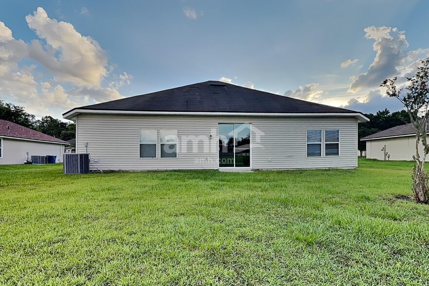 Building Photo - 7093 Rapid River Dr W