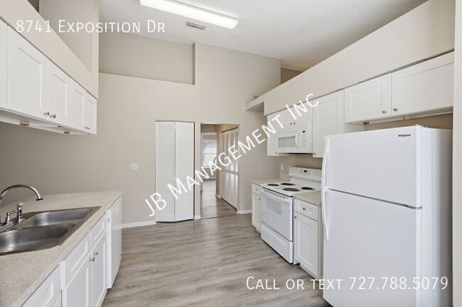 Building Photo - 8741 Exposition Dr