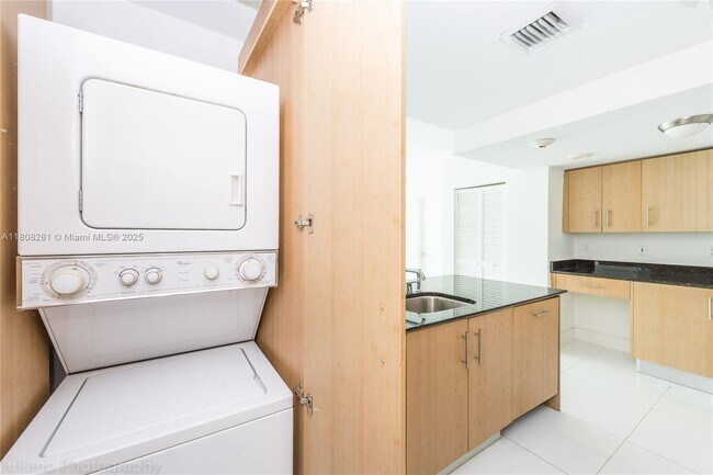 Building Photo - 10275 Collins Ave