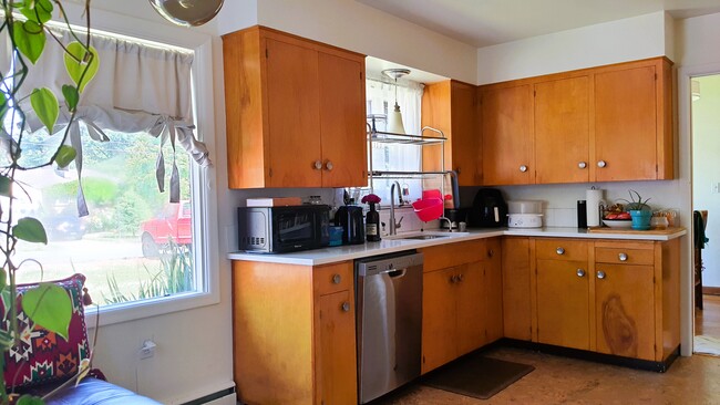 Kitchen with cafe windows - 3645 SW 108th Ave