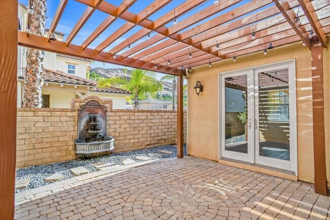 Building Photo - "Spacious 4-Bedroom Retreat with Cozy Fireplace on Starfall Way, Santa Clarita!"