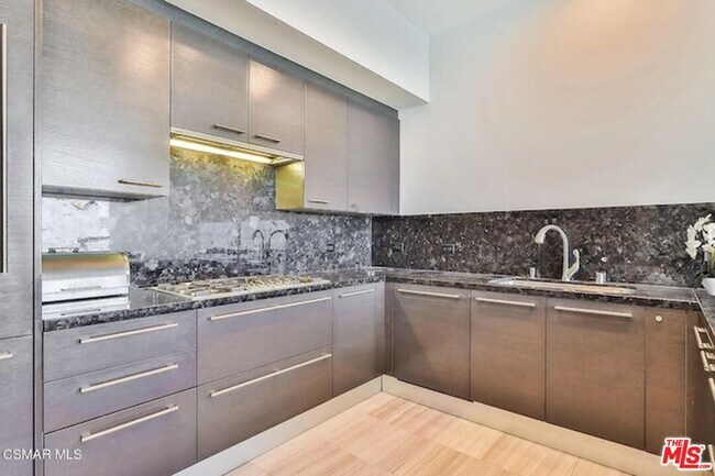 Building Photo - 900 W Olympic Blvd