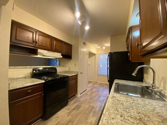 Building Photo - Charming 2 Bedroom, 2.5 Bath Condo, Move-In Ready! Step into this beautifully maintained condo fe...