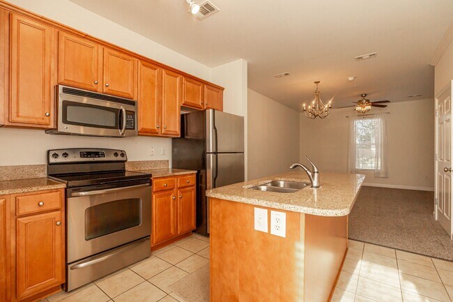 Building Photo - Located just Steps from Shopping, Dining, ...