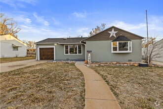 Building Photo - "Charming 3-Bedroom Pueblo Home with Cozy ...