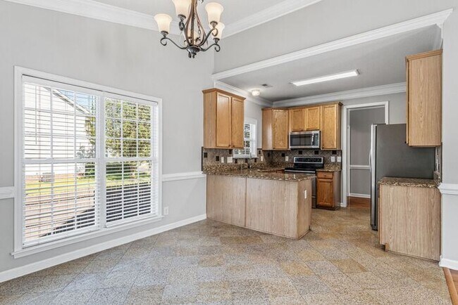 Building Photo - W. Wendover, Beautiful Home, Granite Counter-Tops, SS Appliances, Hardwoods, FP, Deck, Fenced, Ga...