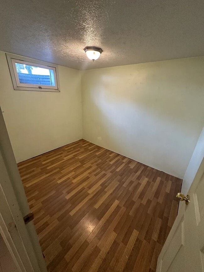 Building Photo - Ideally Located and Updated 4 Bed 2 Bath Fully-Fenced Home w/ Detached Garage/Shop!