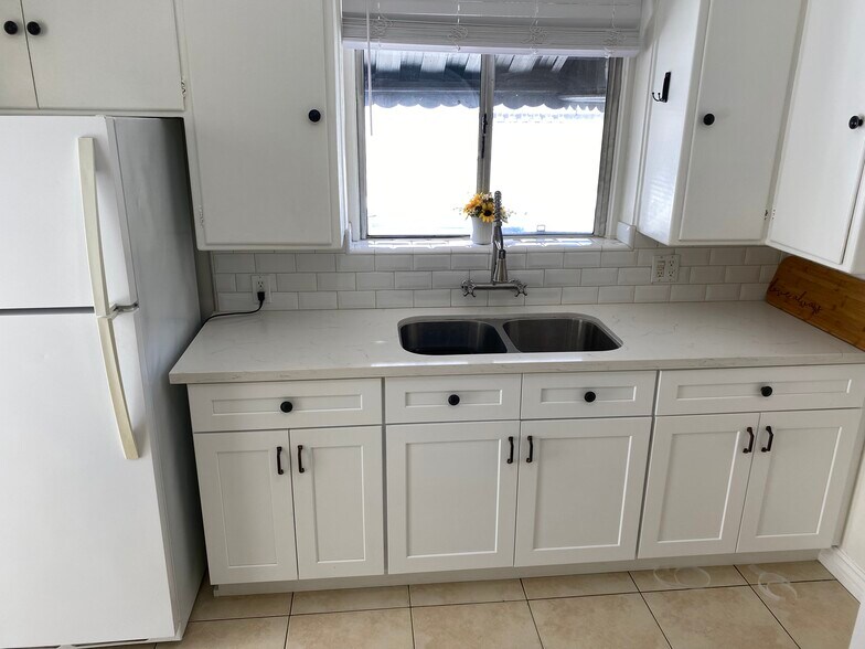Newly renovated kitchen cabinets and countertops - 11280 Morrison St