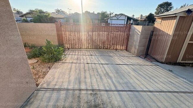 Building Photo - 3 bedroom 2 bathroom home on a corner lot with extra fenced parking.