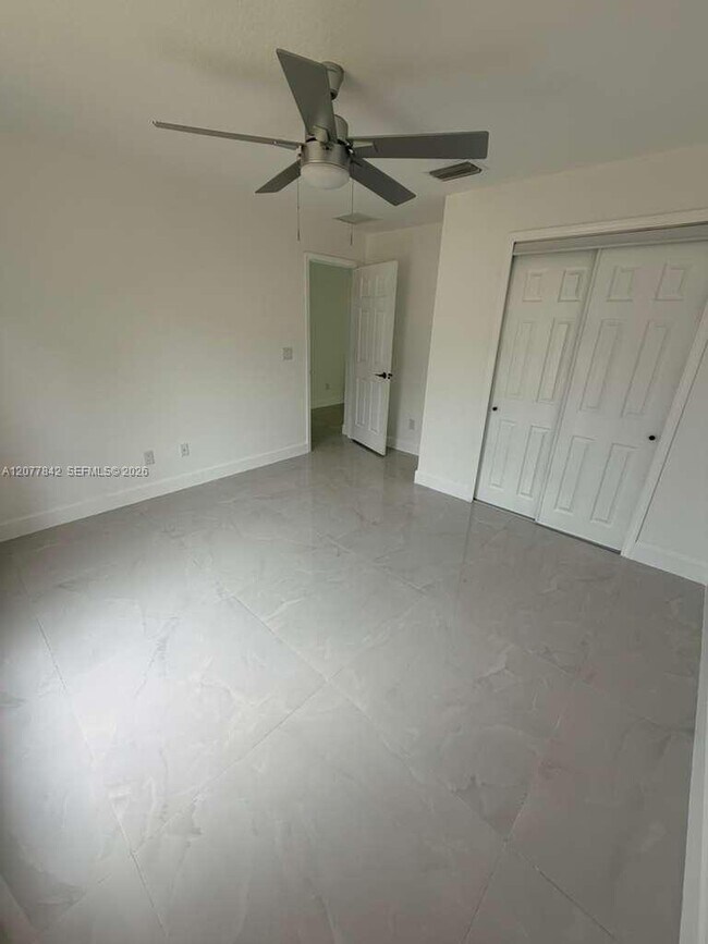 Building Photo - 8636 100th Ct
