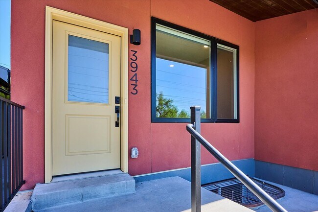 Building Photo - Modern 4-Bedroom Townhome with Rooftop Deck Near Sloan’s Lake & Light Rail